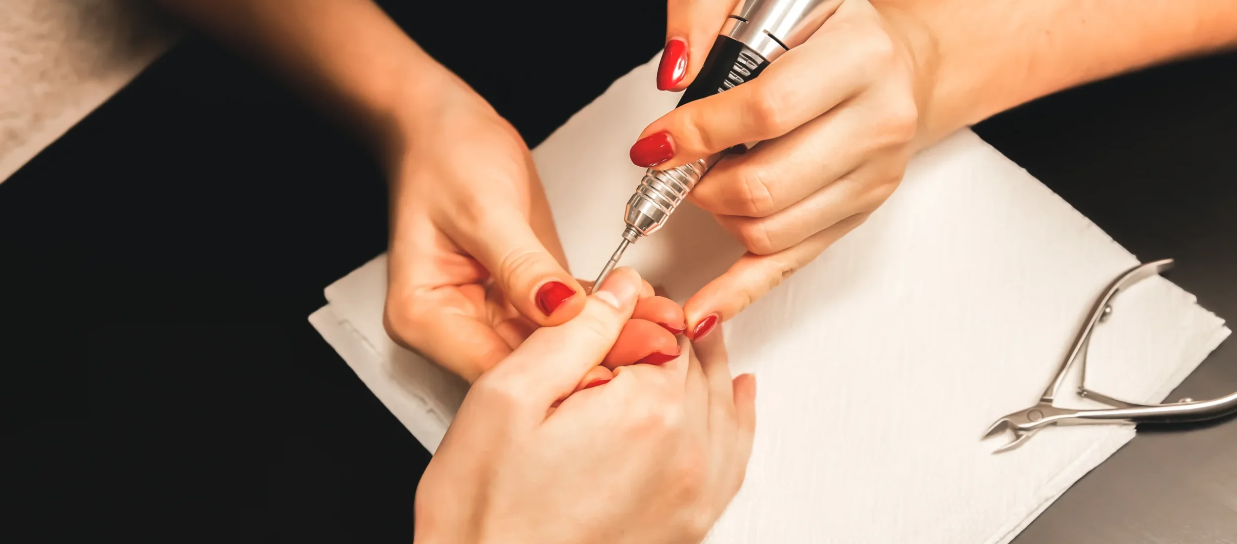 woman-is-making-manicure-salon-procedures-home-beautiful-hands-nails